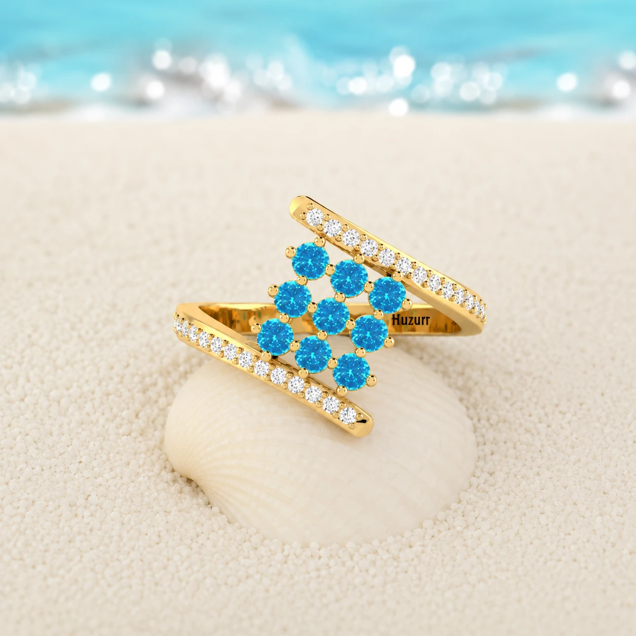 Yellow gold plated bypass ring featuring a 9 stone square cluster of round aquamarines with pave diamond accent bands