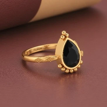 Mesmerizing Pear-Shaped Black Diamond Gold Plated Ring