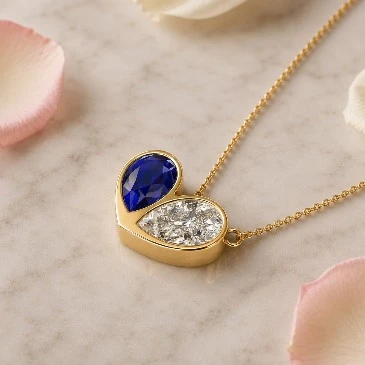 Blue Sapphire And Diamond Gold Plated Two Halves, One Heart Pendant