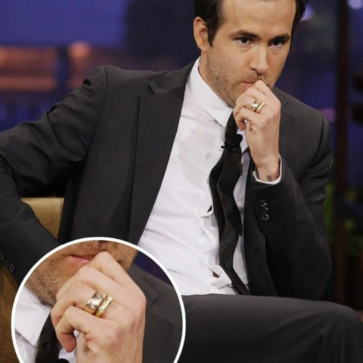 Close-up of Ryan Reynolds wearing multiple stacked gold statement rings
