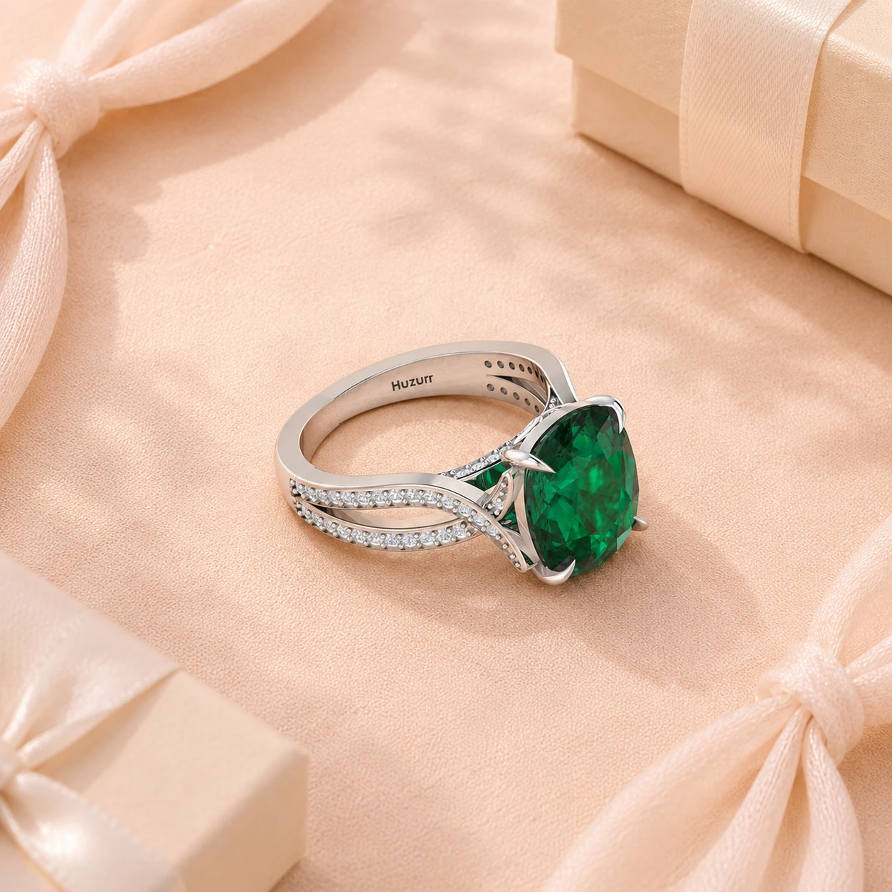 Cushion cut green emerald stone on twisted sterling silver band