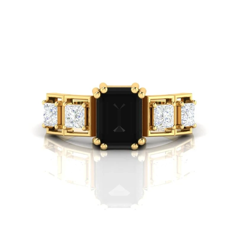 Emerald cut black diamond three stone ring with princess cut white side diamonds in yellow gold
