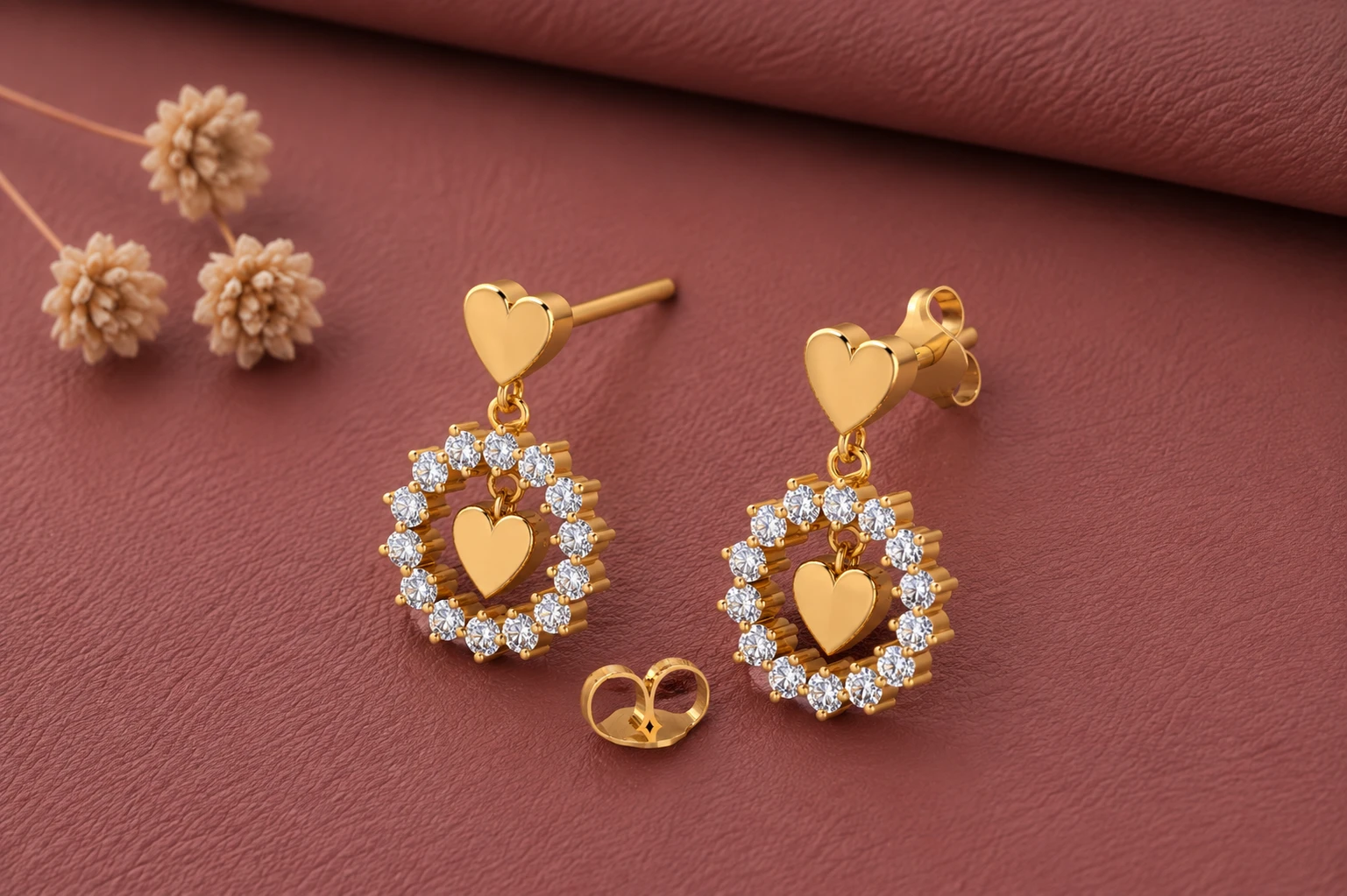 heart drop style earrings in gold plating