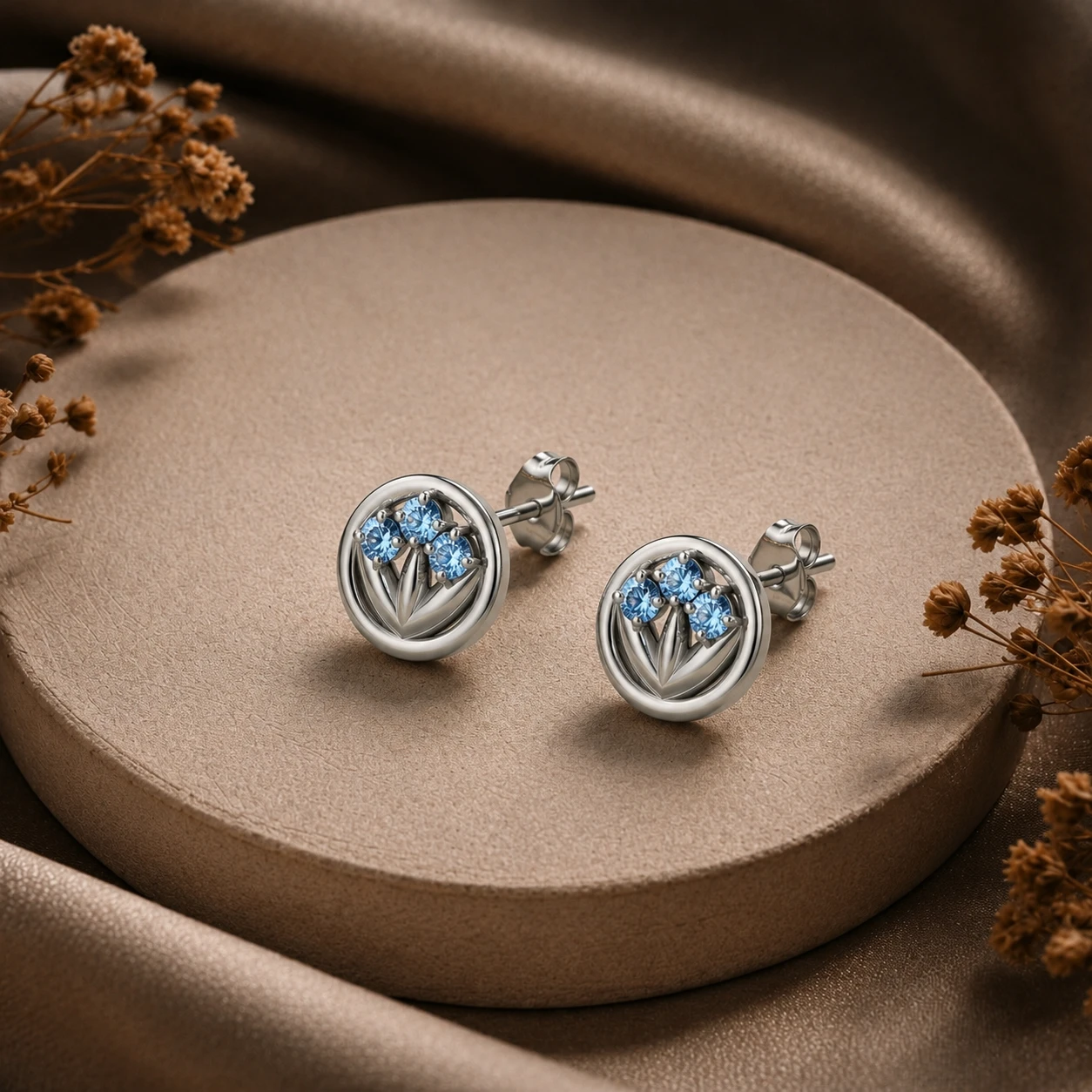 Nature inspired three stone aquamarine leaf earrings crafted from premium sterling silver