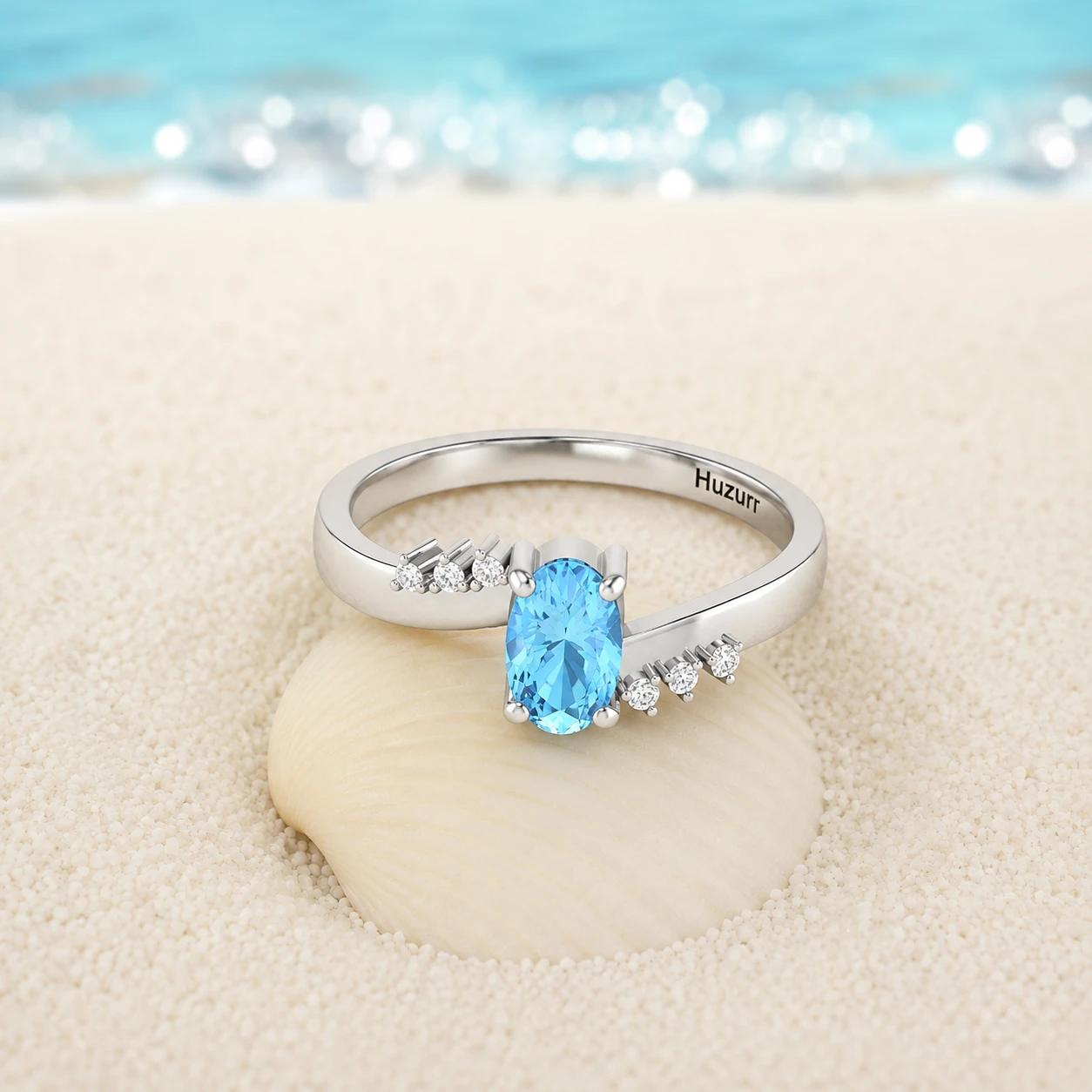 Oval cut aquamarine ring in 925 sterling silver featuring a split level bypass band with round diamond side accents