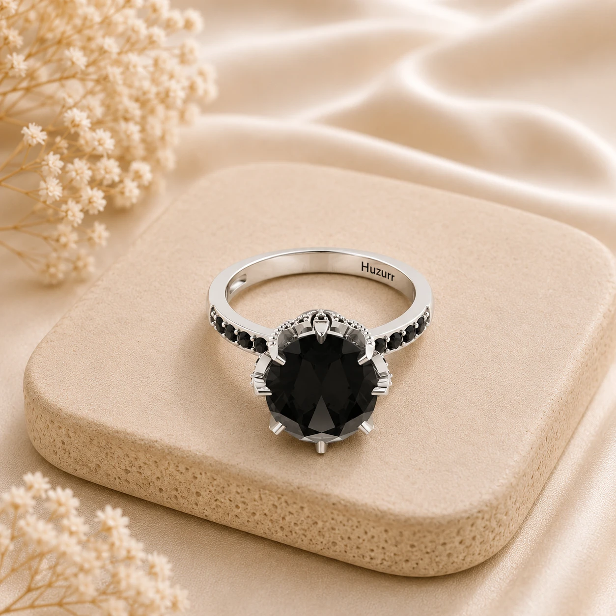 Oval cut black diamond solitaire ring in 925 sterling silver with black diamond pave accents on the band
