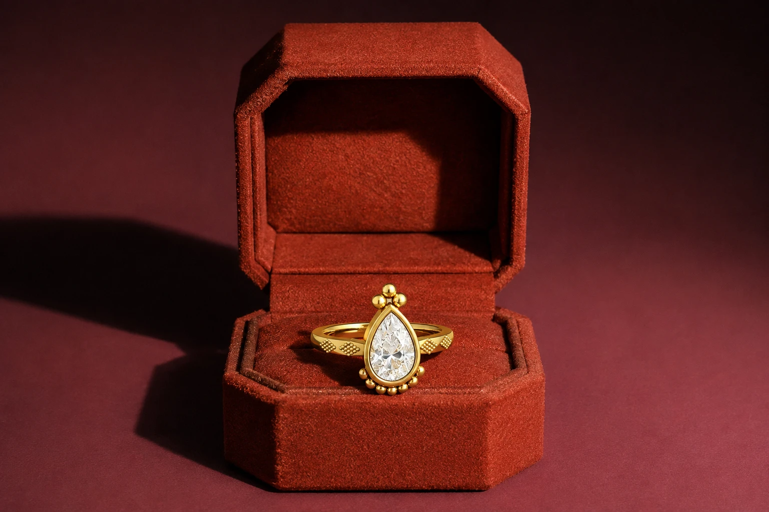 Pear cut diamond engagement ring