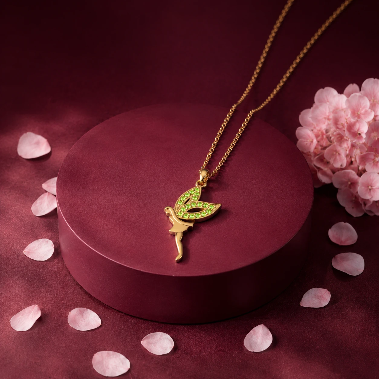 Fairy style necklace pendant crafted in gold plating and adorned with peridot stone