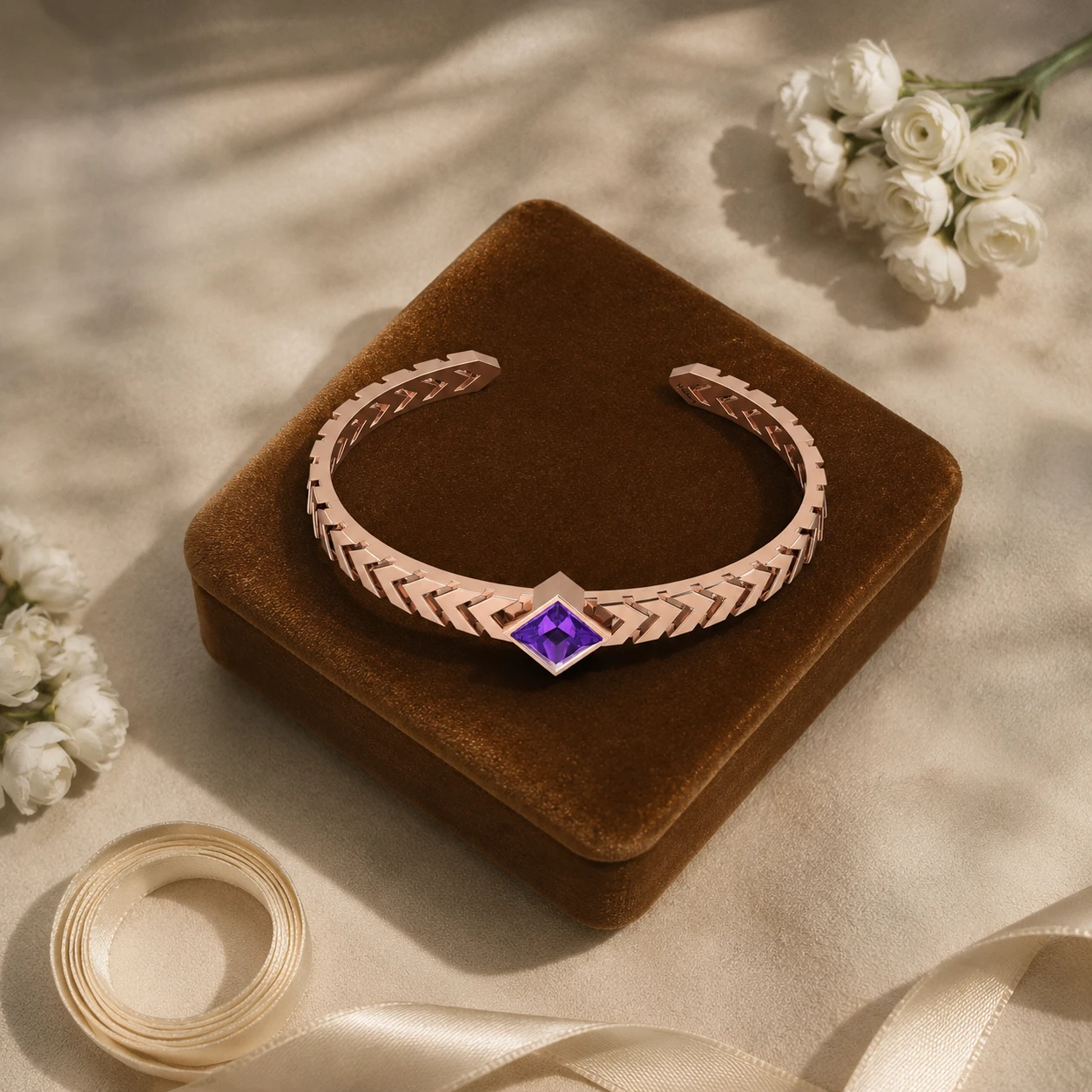 Chevron textured open cuff bracelet centered with a princess-cut purple amethyst in rose gold plating