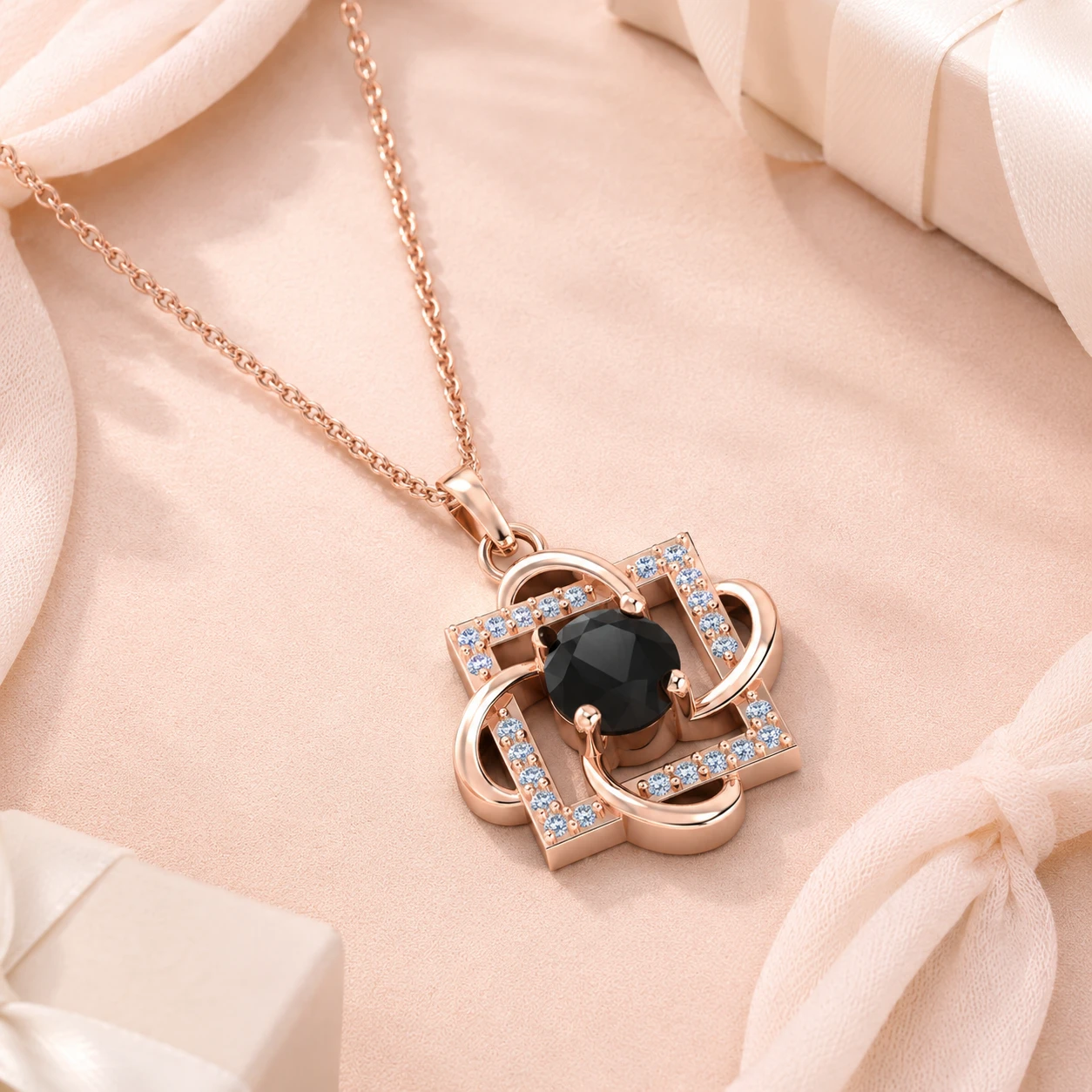 Black diamond center stone in rose gold plated knot pendant with white diamonds