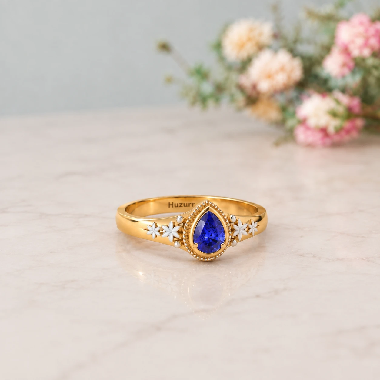 tear-drop-tanzanite-flower-two-tone-ring